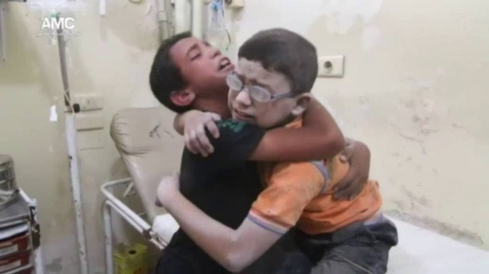 Tragic VIDEO of Syrian boys grieving over killed brother